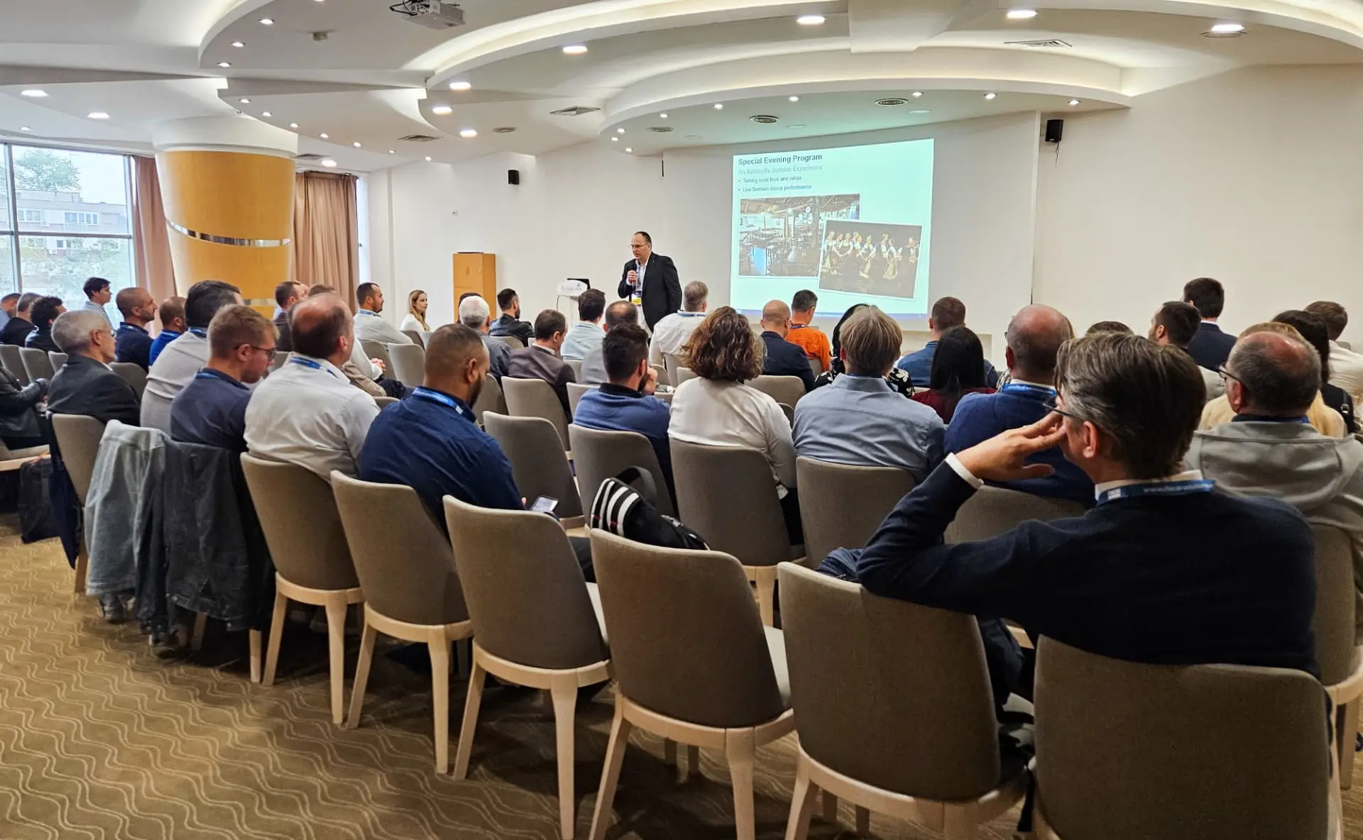 Full conference hall during a session